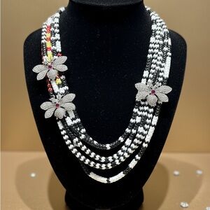 Chic Black and White Beaded Necklace with Floral Charms